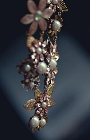 Picture of a necklace hanging off a stand