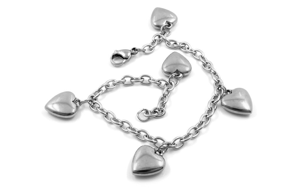 A stainless steel chain bracelet with heart charms