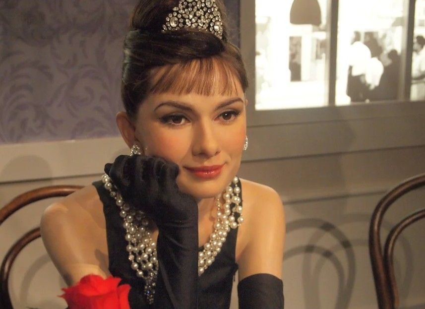 Audrey Hepburn’s model in the wax museum wearing diamond and pearl necklace