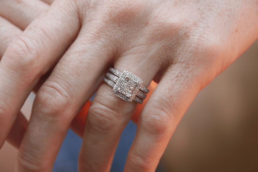 woman-hands-wedding-ring