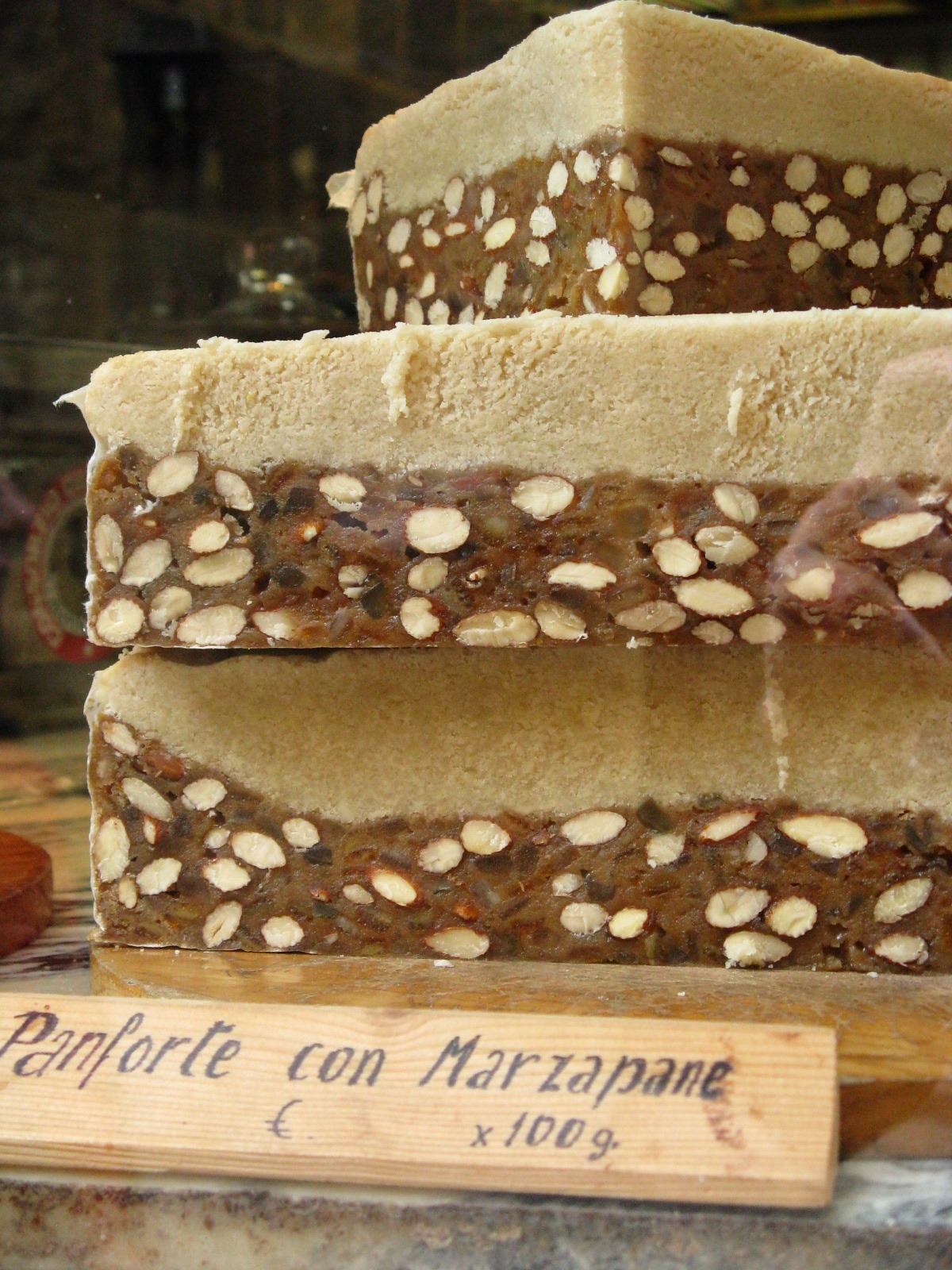 A variation of panforte with a topping of marzipan at a shop in San Gimignano