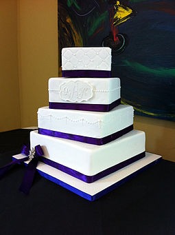 A-wedding-cake-prepared-with-swiss-meringue-buttercream-filling-and-other-ingredients